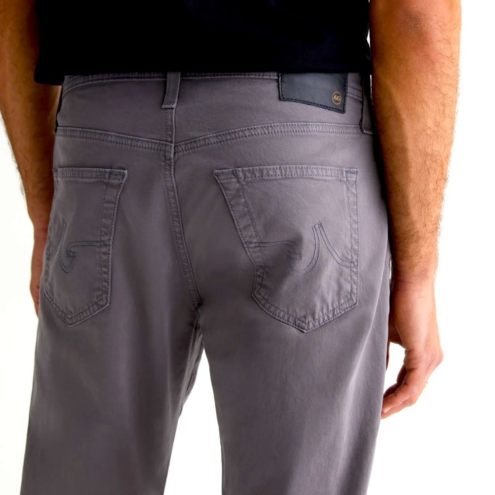 AG sueded blue Graduate men’s jean in 34. New condition.